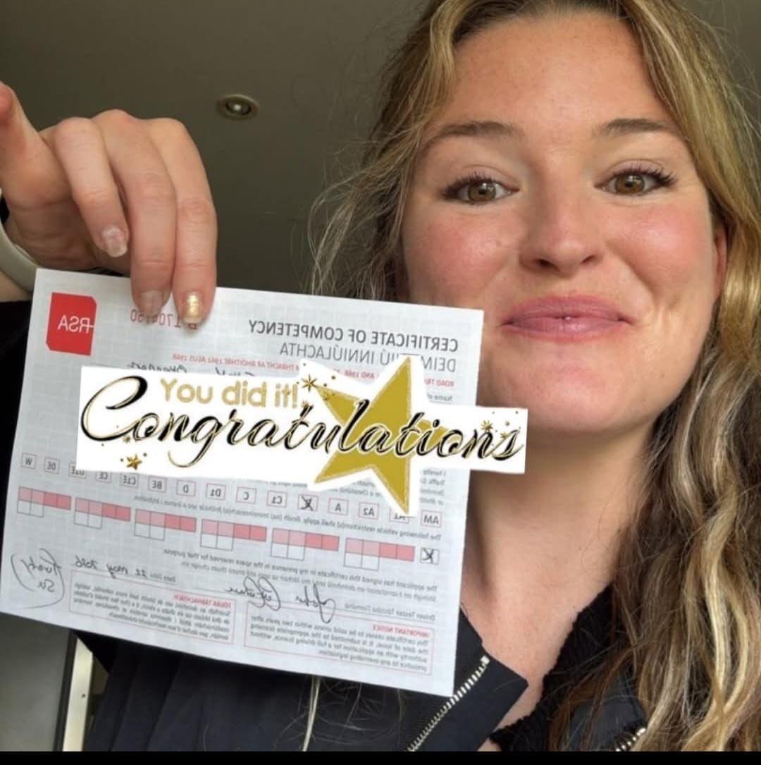 Happy student celebrating their Certificate of Competency